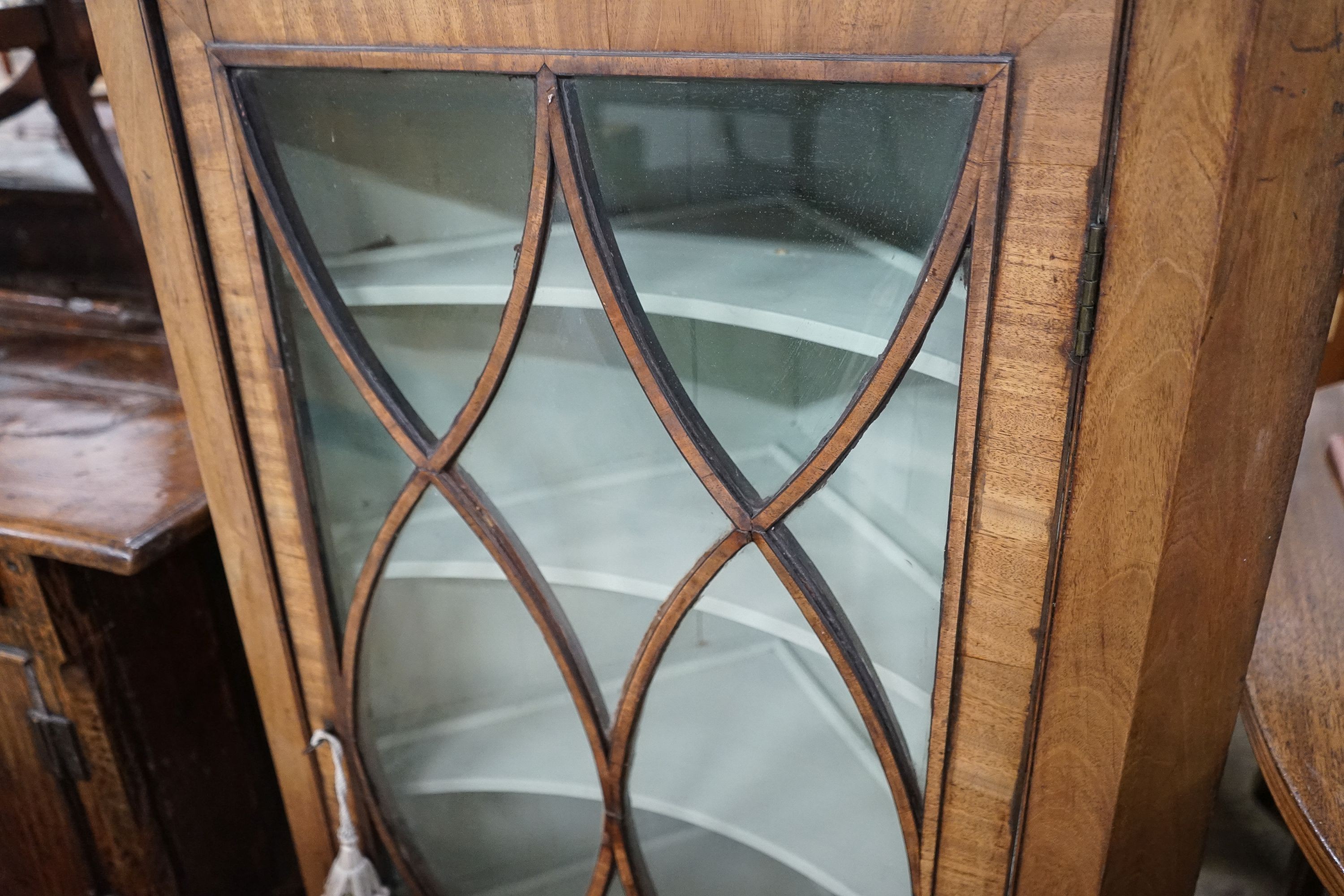 A George III mahogany hanging corner cabinet, width 82cm, depth 46cm, height 127cm